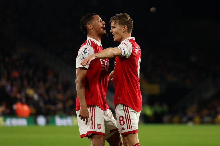 12th November 2022 Molineux Stadium, Wolverhampton, West Midlands, England Premiership football, Wolverhampton Wanderers versus Arsenal Martin Odegaard of Arsenal celebrates his second goal for 0-2 with William Saliba of Arsenal PUBLICATIONxNOTxINxUK ActionPlus12449303 ShaunxBrooks 