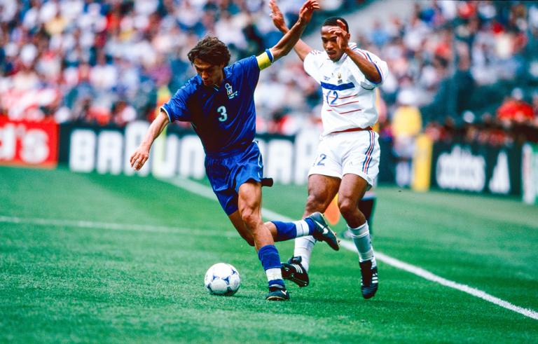 PARIS, FRANCE - JULY 03: Thierry Henry of France and Paolo Maldini of Italy in action during the World Cup quarter final match between France (0) and Italy (0) at the Stade de France on July 03, 1998 in St Denis, France. (Photo by Simon Bruty/Anychance/Getty Images)