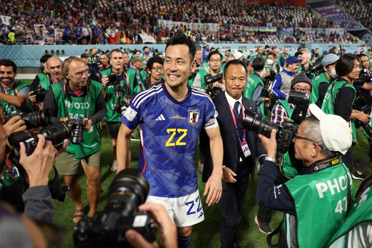 DOHA, QATAR - DECEMBER 01: Maya Yoshida of Japan celebrates their 2-1 victory and qualification for the knockout stage after the FIFA World Cup Qatar 2022 Group E match between Japan and Spain at Khalifa International Stadium on December 01, 2022 in Doha, Qatar. (Photo by Patrick Smith - FIFA/FIFA via Getty Images)